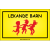 Skylt "Lekande Barn" med varningstext Lekande barn och gul bakgrund med siluett av hoppande barn i rött.